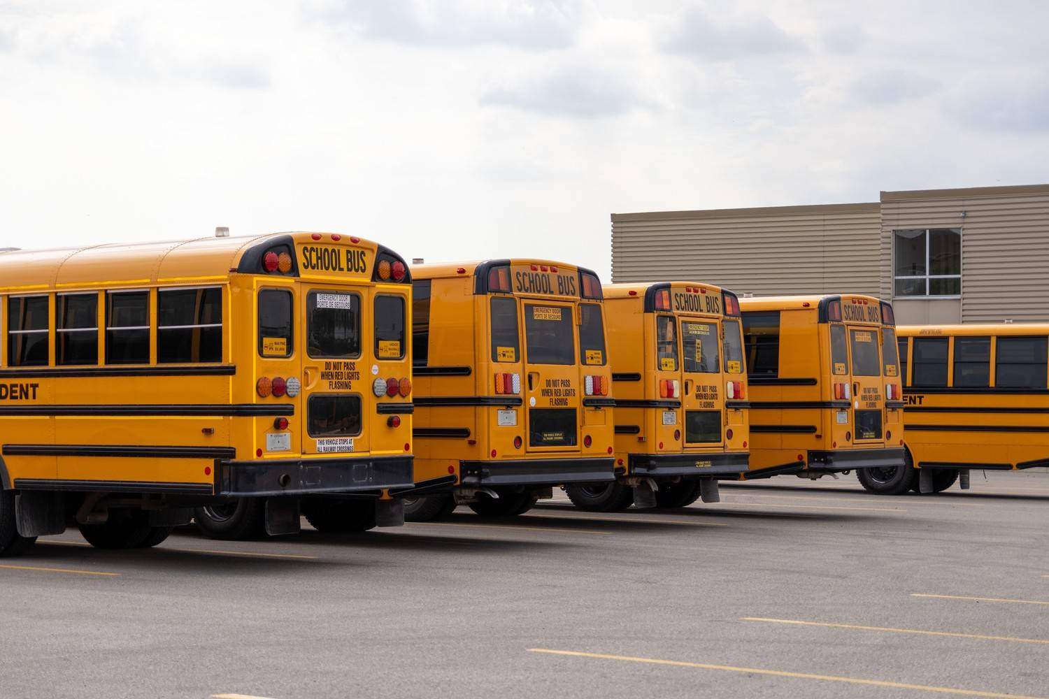high-traffic parking lot during back-to-school drop-off